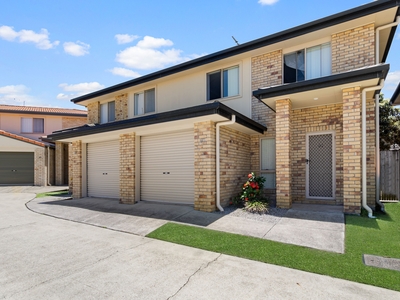 Exceptional Investment Potential: Contemporary Townhouse in Premier Growth Pocket!