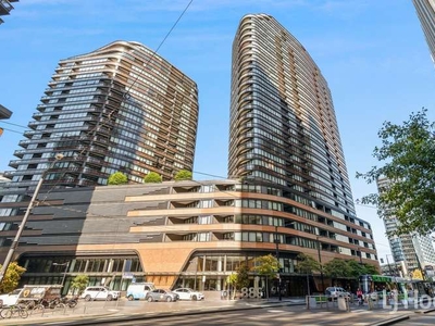 Exclusive Waterfront Luxury: Captivating City Views Await at 889 Collins Street!