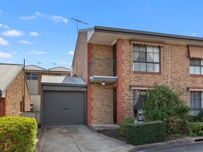 Spacious 2 Bedroom Townhouse with Carport and Private Rear Courtyard