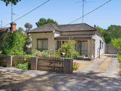QUALITY PERIOD HOME POSITIONED IN A QUIET WIDE TREE-LINED STREET