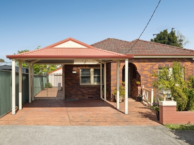 Charming Full Brick Family Home with Tranquil Garden