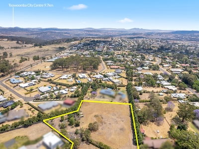 Prime Investment Opportunity: Expansive 10700m2* Flat Land in Highfields - Potential for Subdivision