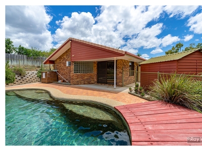 Inviting Lowset Brick Home with Inground Pool!