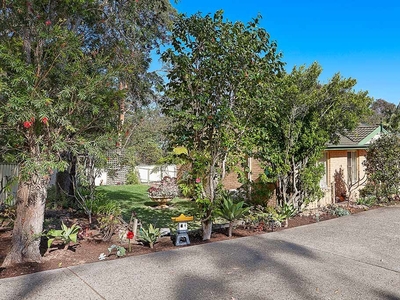 LOW MAINTENANCE HOME BACKDROPPED BY THE SERENITY OF NATURE