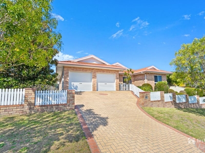 IMMACULATELY CARED FOR RESIDENCE IN SOUGHT-AFTER CORLETTE POCKET