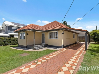 Unlock Your Queensland Dream at 22 Taylor: A Retro Haven on a Corner Block Awaiting Your Unique Touch!
