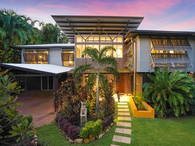 Exquisite tropical home in blue-chip beach location!