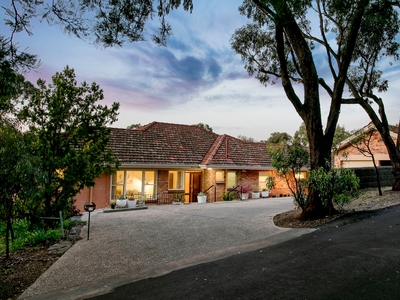 A secluded family home with beautiful vistas to enjoy for the years to come!