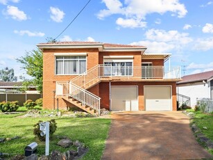 Stunning Split-Level Gem with Pool in Prime Location!