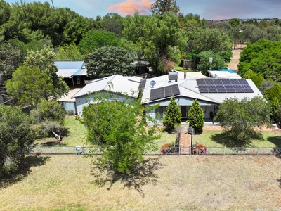 Entertainers Delight on a Spacious 1.2 Acres