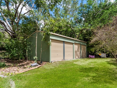 Unique Opportunity: Over 2 Acres in Alligator Creek with Large Shed and Studio Included!