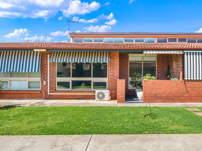Immaculately presented, solid brick, rear-located unit