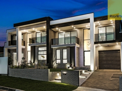 CONTEMPORARY FAMILY LIVING IN THIS BRAND NEW DUPLEX