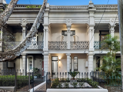 A grand architect-revived Victorian Italianate terrace