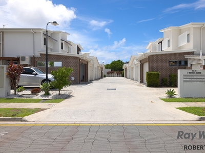 CLOSE TO WATER, RESORT STYLE LIVING - 3 BEDROOM TOWNHOUSE IN PRESTIGIOUS COMMUNITY