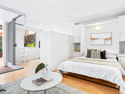 Sun-drenched Studio apartment with courtyard offering a stylish Indoor/Outdoor living abode