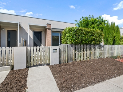 A Charming Three Bedroom Courtyard Home!