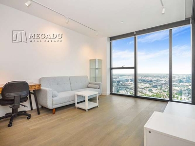 Elevated Elegance: Furnished Luxury Apartment with Breathtaking City Views at Swanston Central