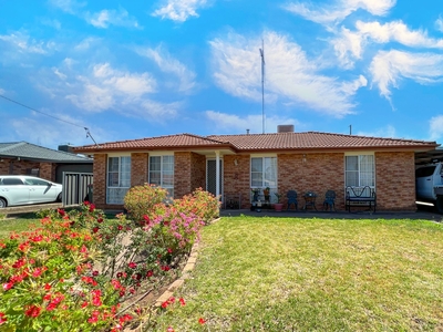 Charming 3-Bedroom Brick Home with Spacious Living